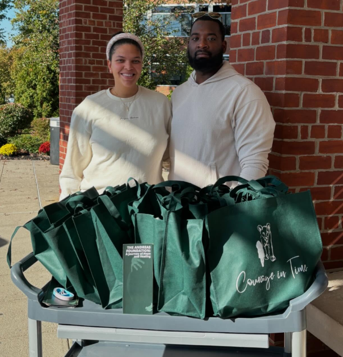 Team members of The Andreas Foundation preparing and delivering care packages for families in need.