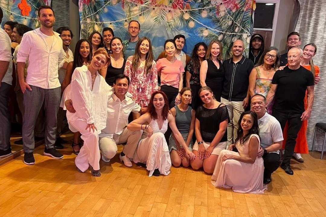 YCD Studio social dance community posing together at the studio in Hermosa Beach