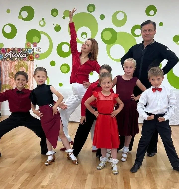 Anna Trebunskaya, Konstantin Yakunin, and our kids having fun at a teams match.