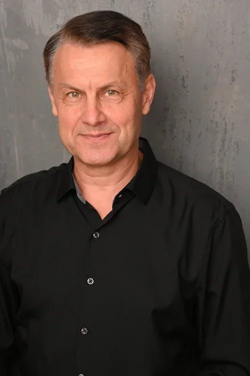 ballroom and Latin dance instructor headshot in studio environment