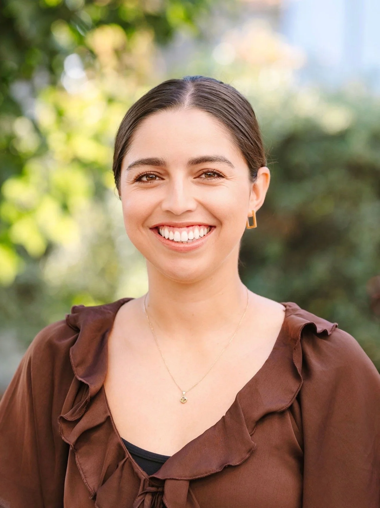 youth ballroom dance instructor headshot in a studio setting