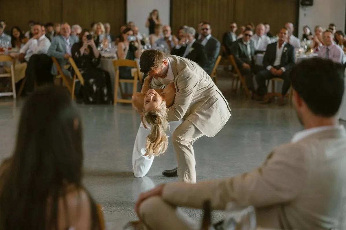 Wedding first dance laughing during dip