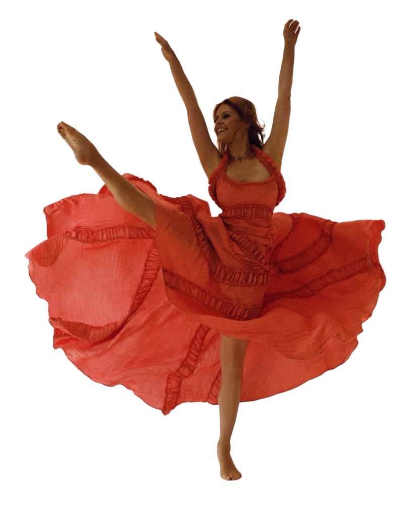 Studio owner dancing in beautiful flowing orange dress