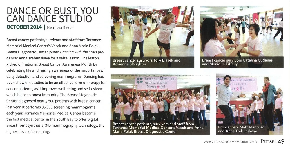 group of people at a breast cancer charity dance event inside a dance studio