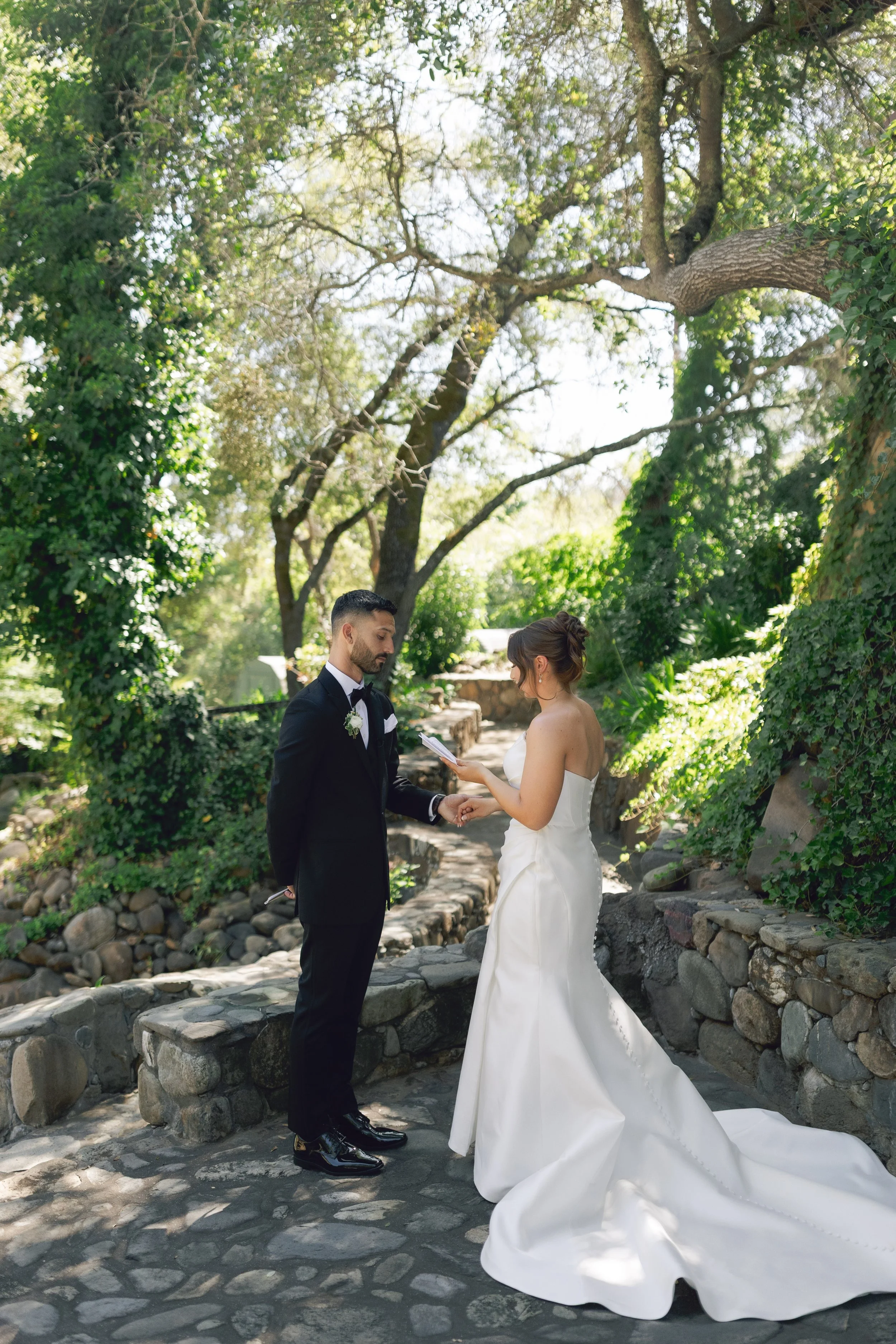 Private vow exchange at a Bay Area wedding venue, intimate outdoor ceremony surrounded by nature.