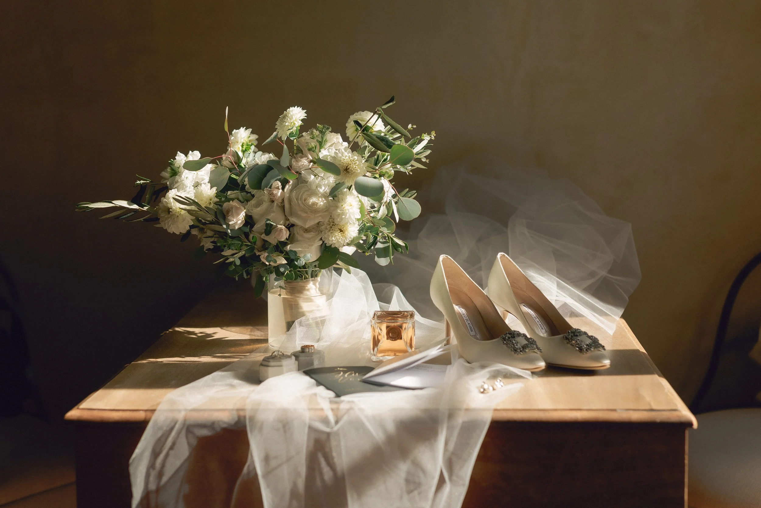 Manolo Blahnik wedding shoes with bridal bouquet, luxury wedding detail inspiration for brides.