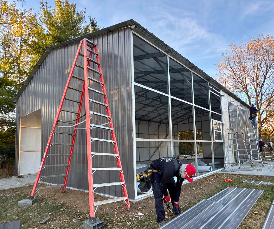 Custom garage with moisture barrier insulation and covered patio.