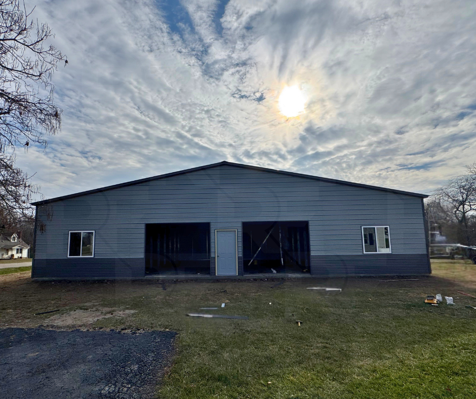 Custom steel building with open center section and enclosed 12×35 lean-tos.