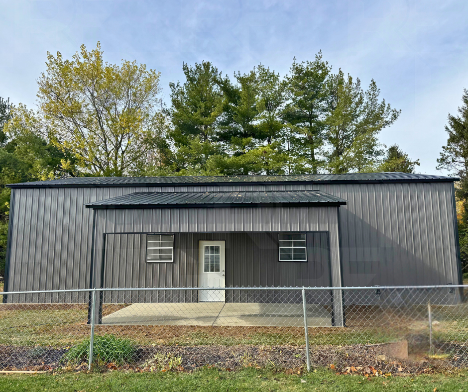 Custom steel garage with integrated 20-foot covered porch.