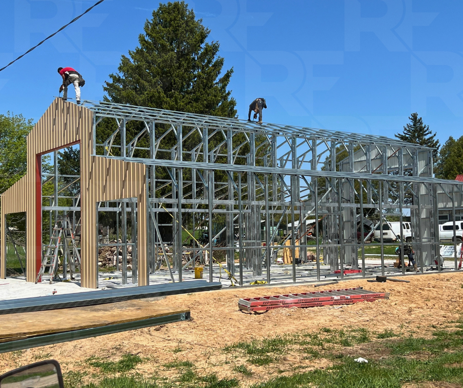 18x50 center steel building with two 12-foot enclosed lean-tos