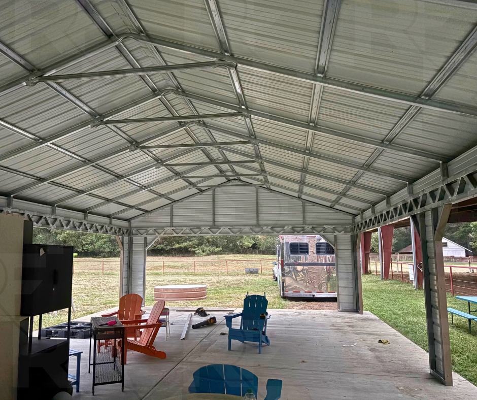 Steel pavilion providing covered space for vehicles and equipment