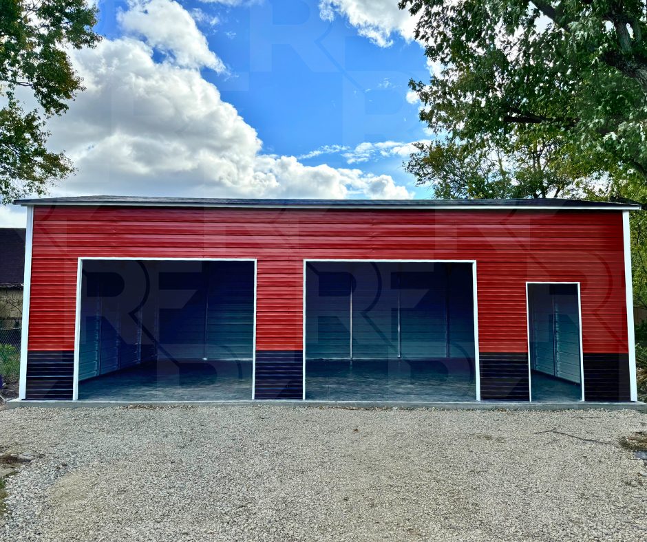 Red, Black and White 24 wide steel building with two doors and one walk in.