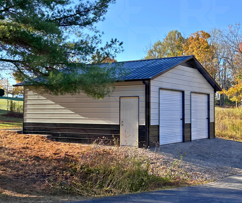 Custom metal garage with black accent panel at roof peak