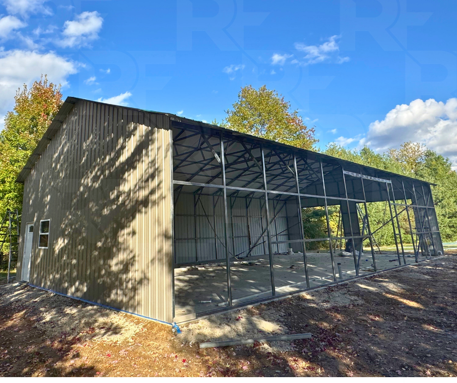 Custom steel workshop with three garage doors in Bellbrook