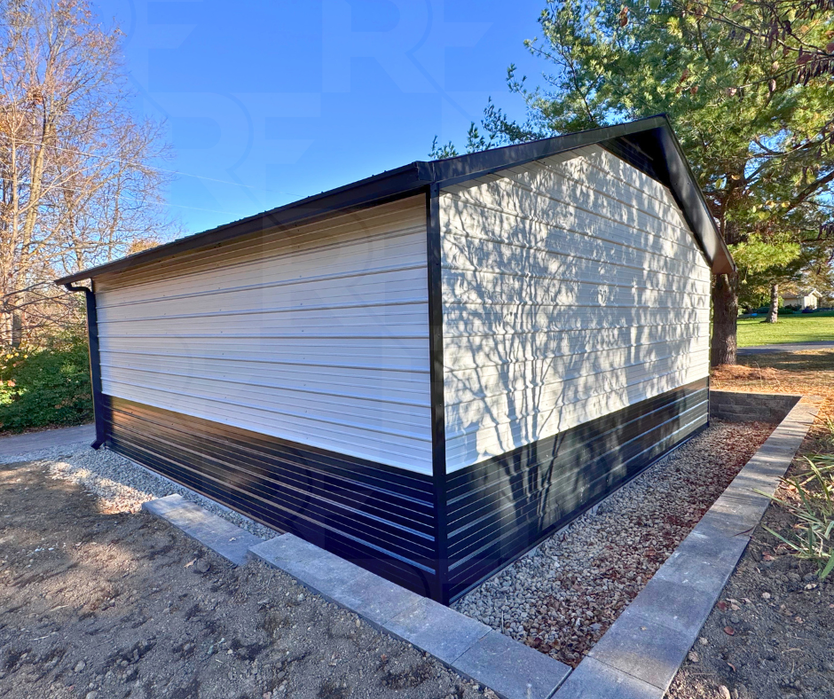 Metal garage with one-foot roof overhang and gutters