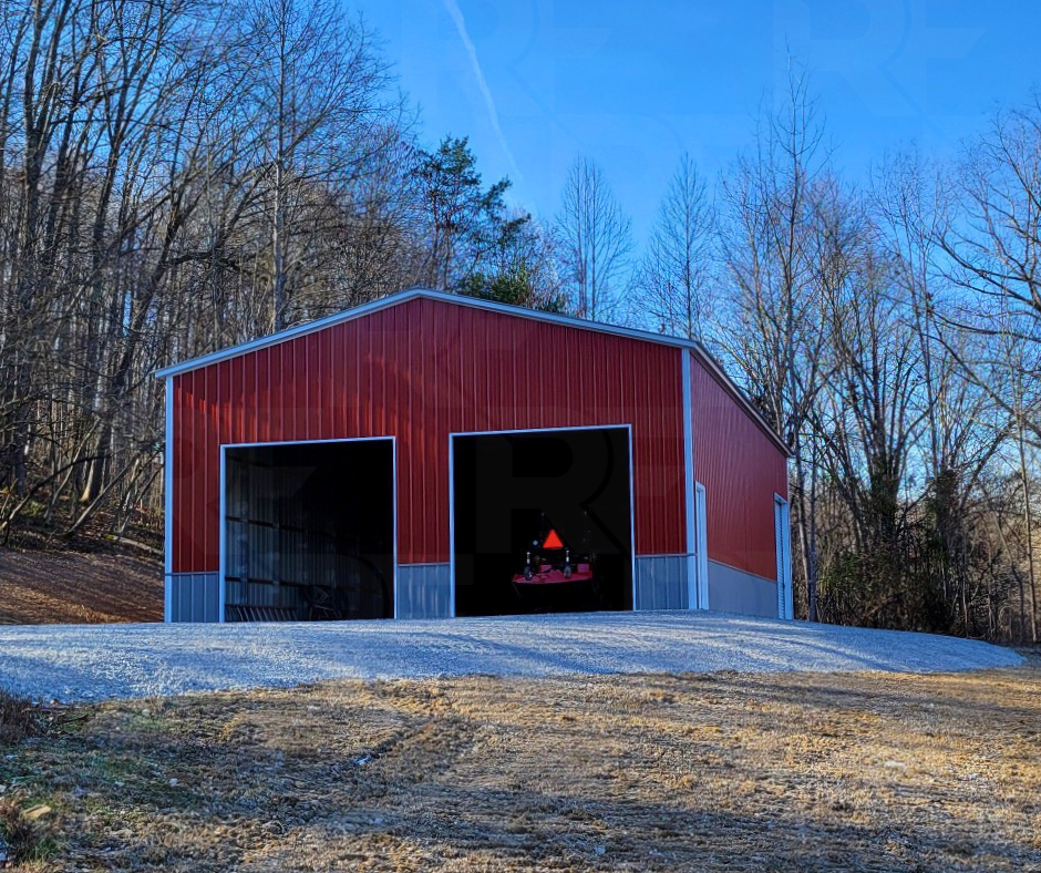 Large steel workshop with four 10×10 garage door openings.