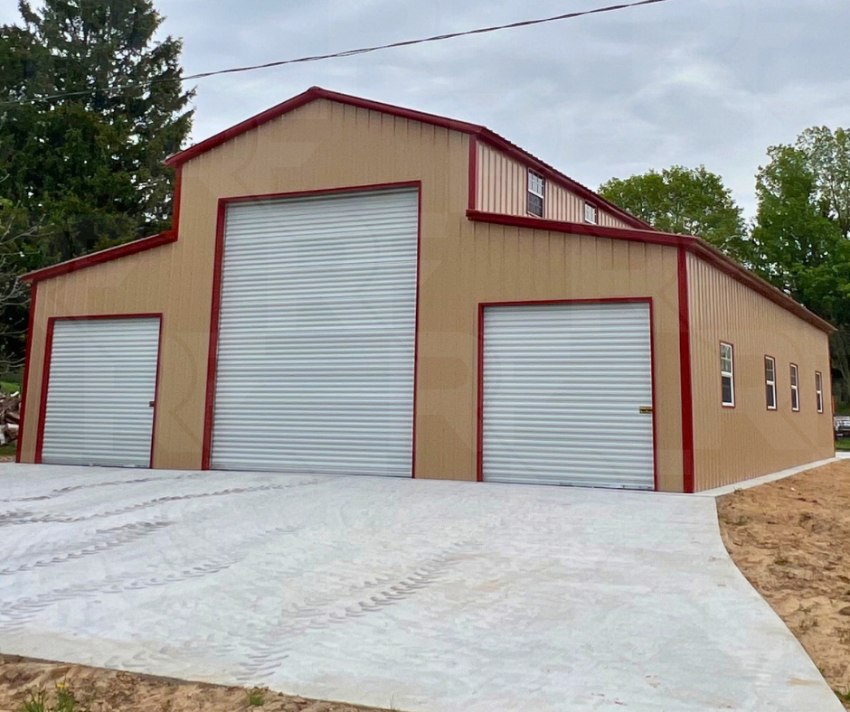 Metal barn with large equipment access doors and vertical siding
