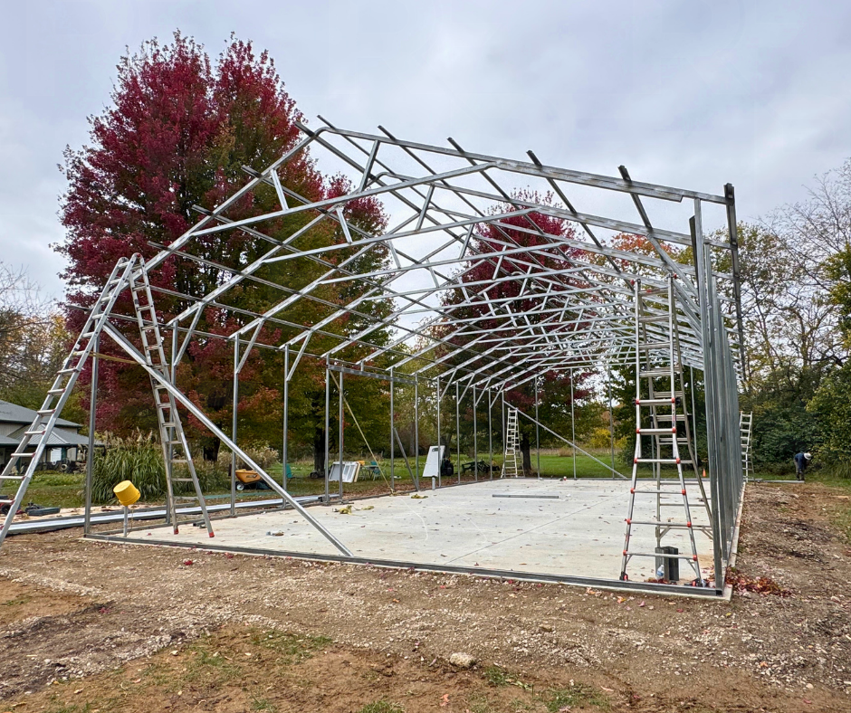 30×60×12 metal frame for workshop in Bellbrook, Ohio with vertical siding
