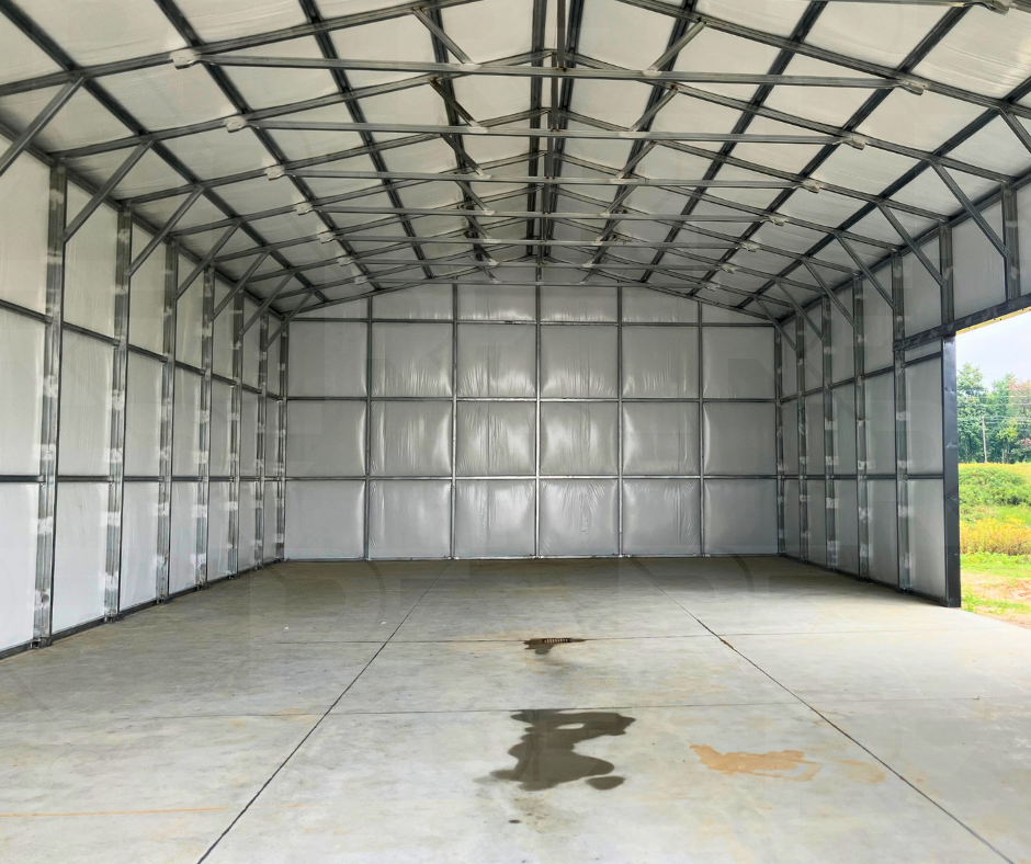Large enclosed metal building designed for vehicle and equipment storage