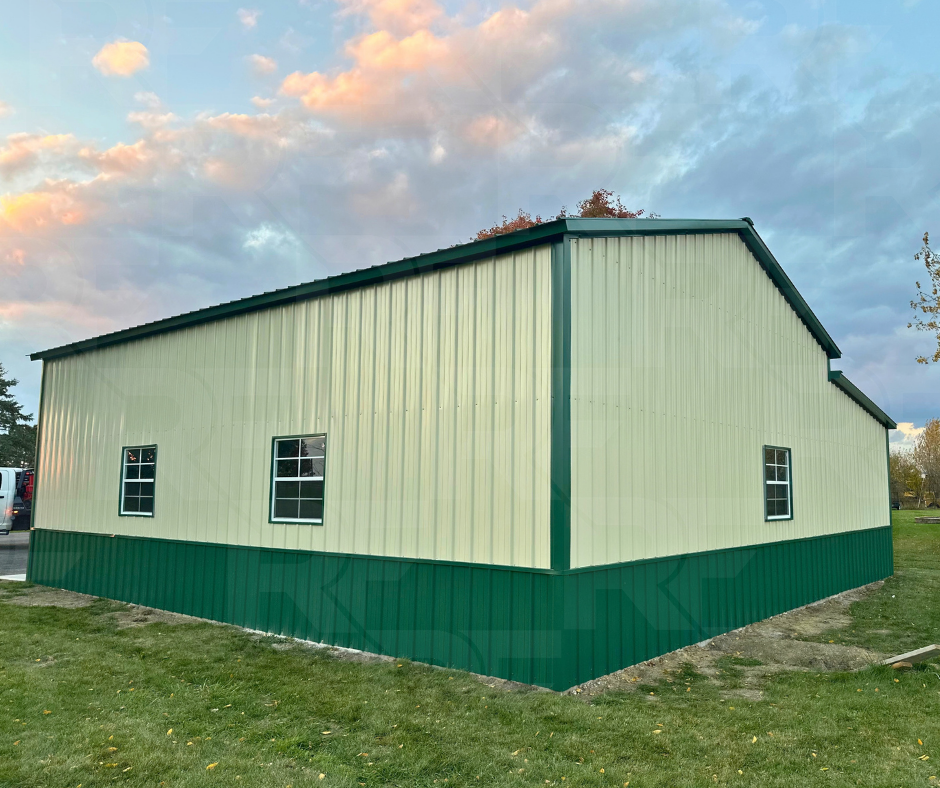 Metal workshop with vertical siding and green trim