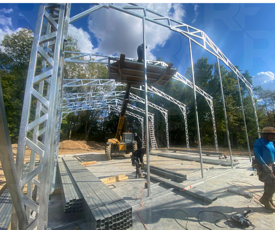 Custom agricultural metal building designed for tractor and equipment storage.