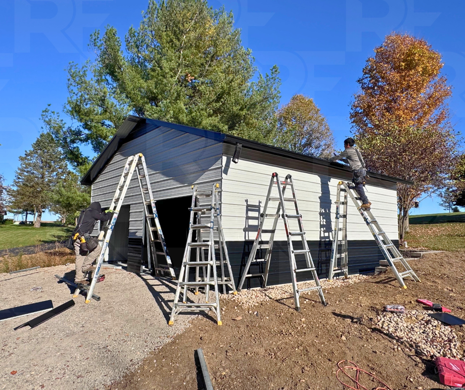 Two-bay steel garage with horizontal metal siding