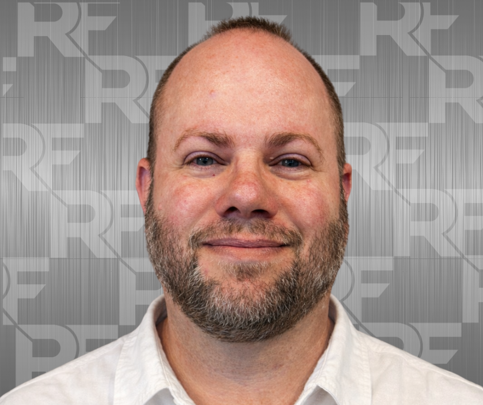 Picture of Adam Satterthwaite, RightFit logo in the background, brushed steel.