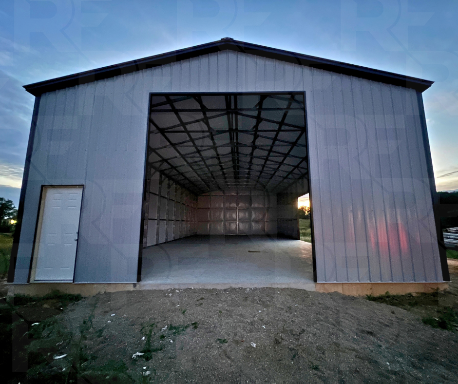 30x60 steel workshop with vertical roof and metal siding