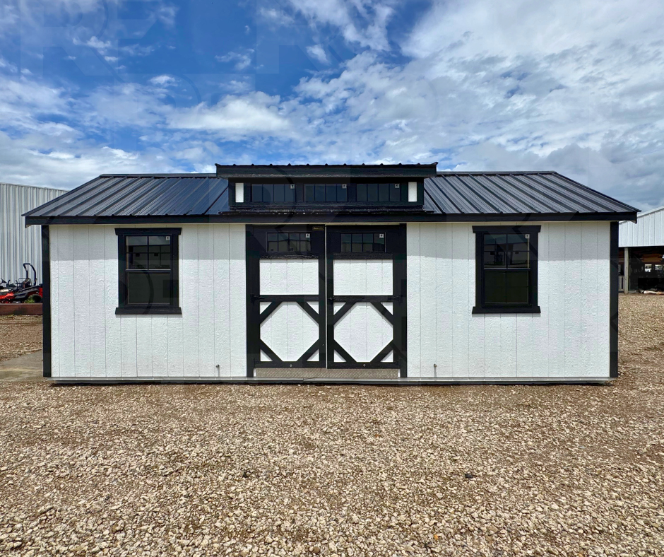 12x24 deluxe shed, black and white lot model in Springfield Ohio with dormer and transom windows