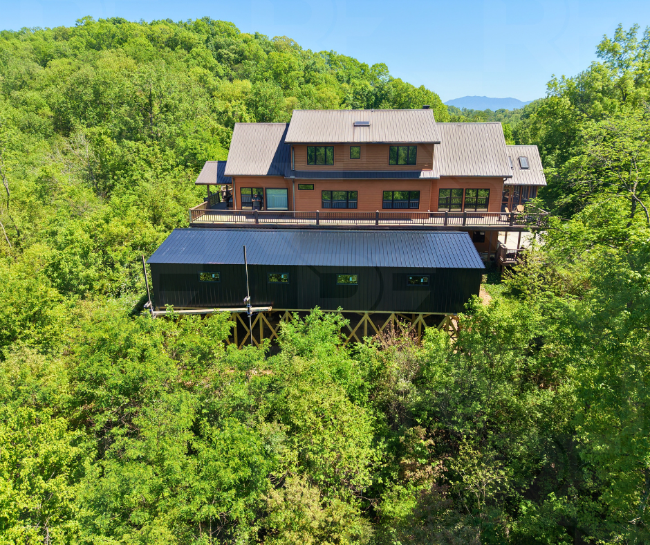 All black 30x60x7 steel building with vertical siding, in the mountains of Seymour, Tennesse