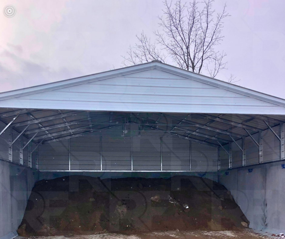 Open-front steel aggregate storage building with vertical roof