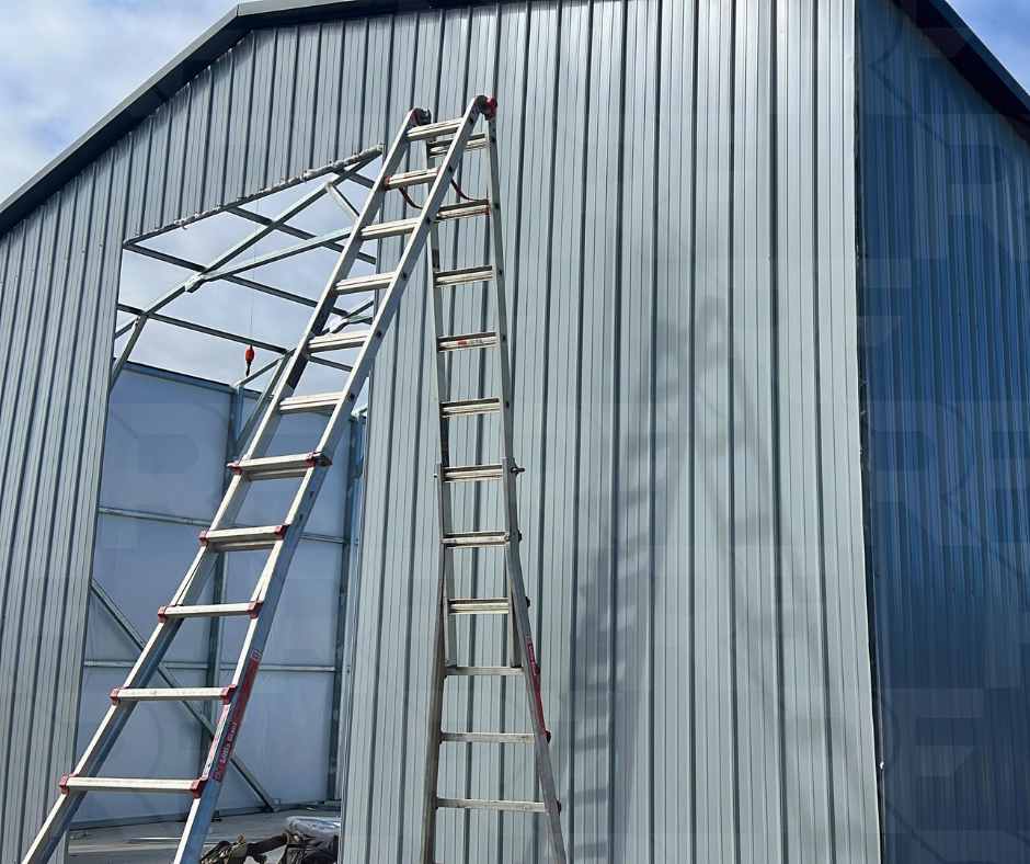 The Long Haul steel building with gray siding and black trim