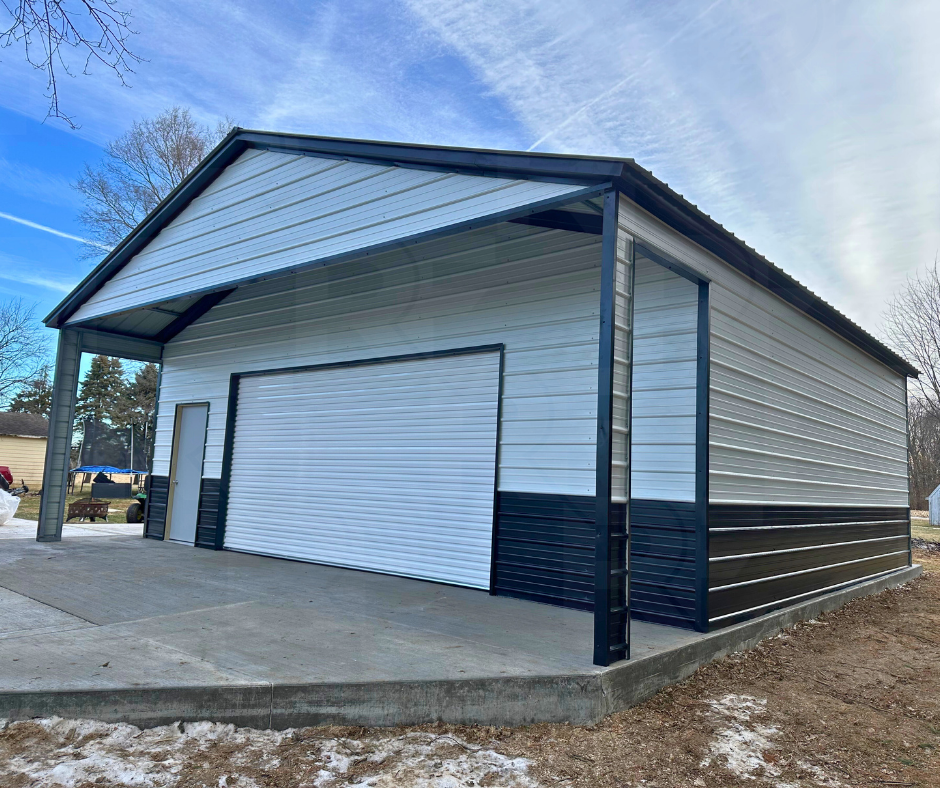 White and black steel building with a 16x8 door and a porch