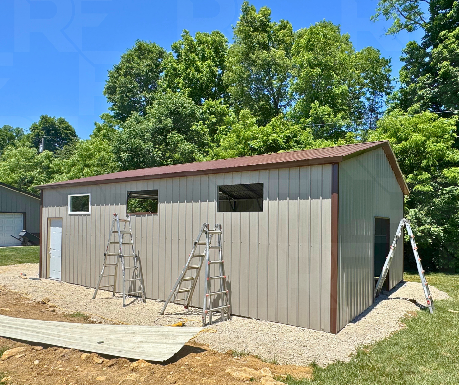Steel garage with three 4x2 windows and residential entry door