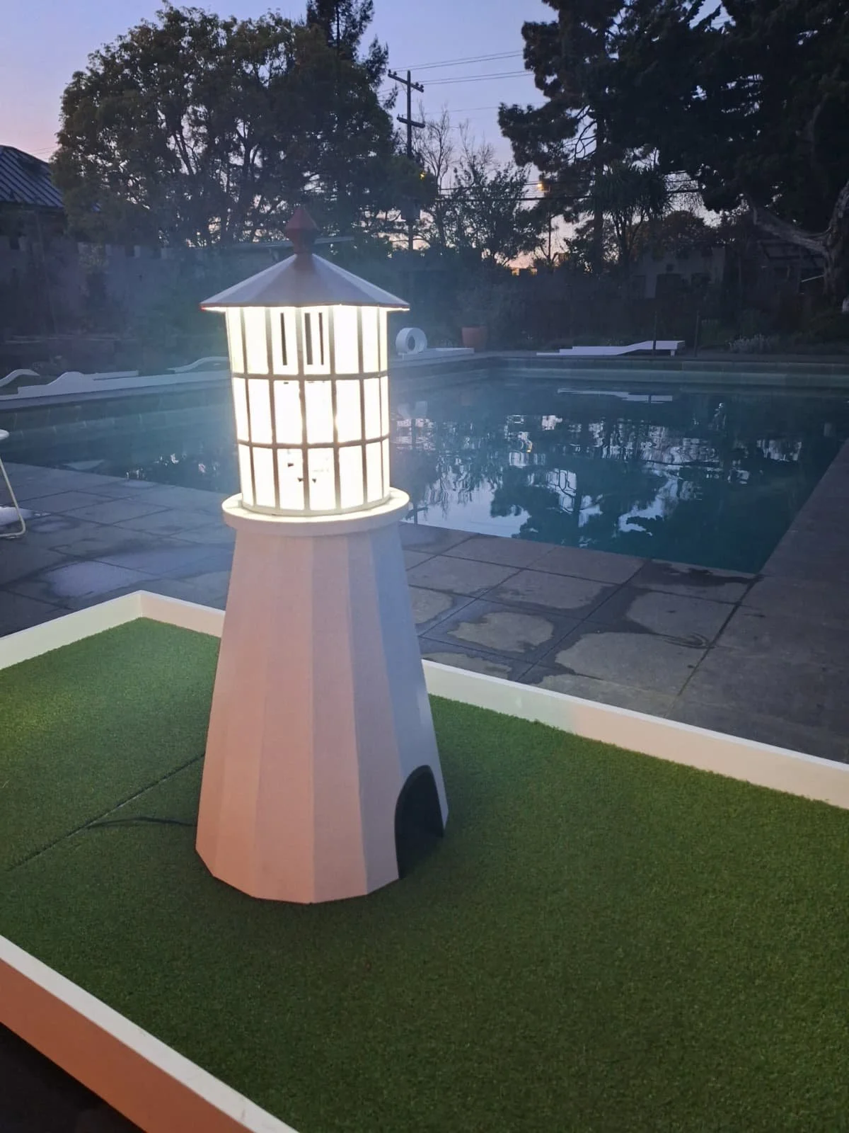 One of Perfect Nine's mini golf holes, a model of the Point Reyes Lighthouse.