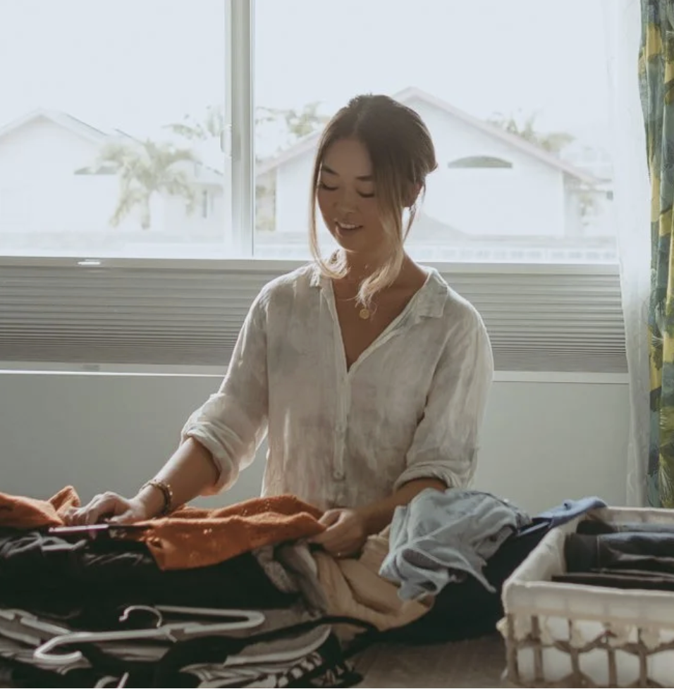 woman organizing clothing