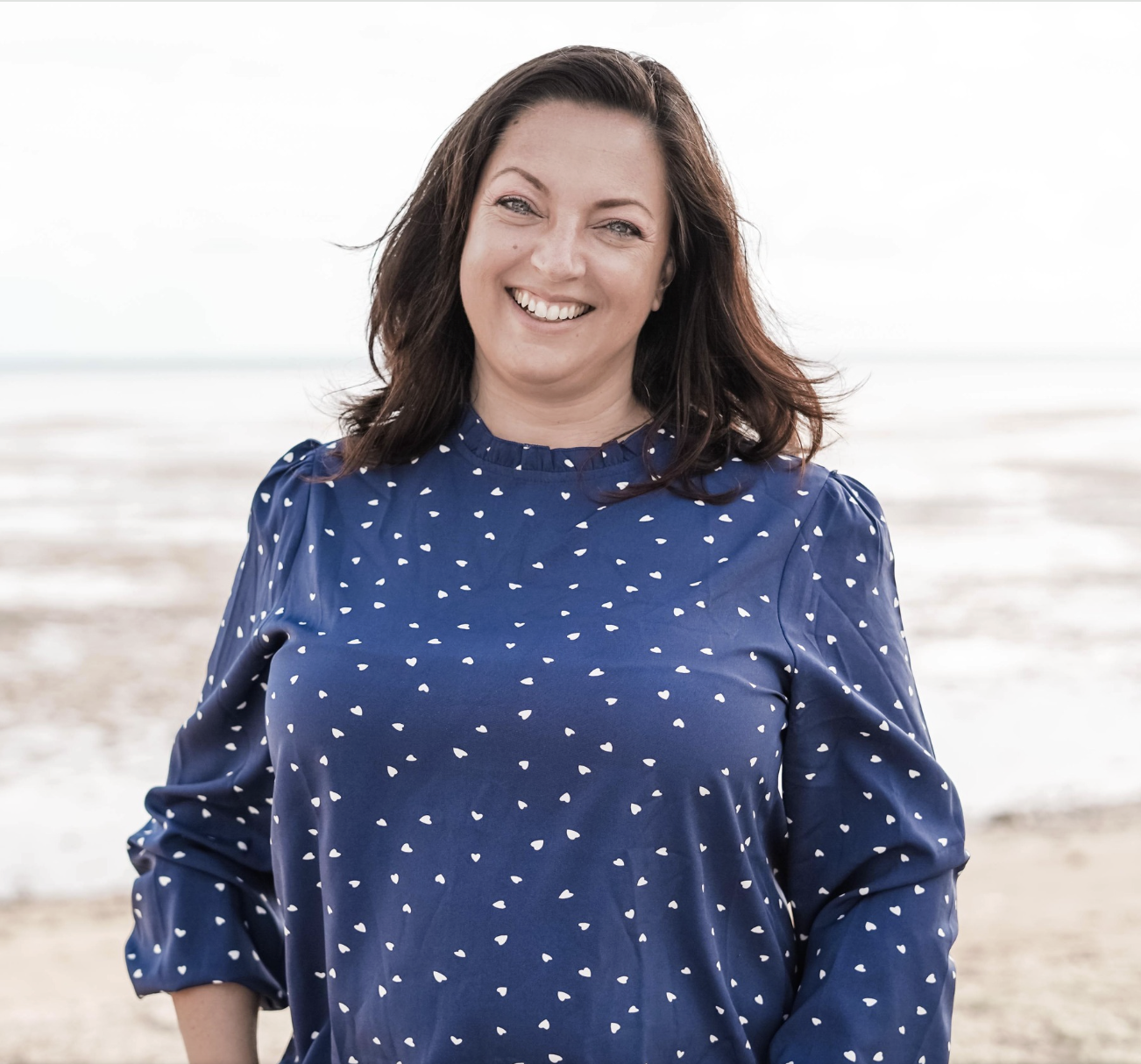 woman headshot on beach