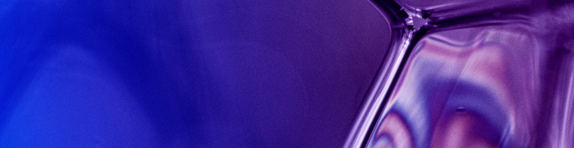 A glass-like object on a blue violet gradient background