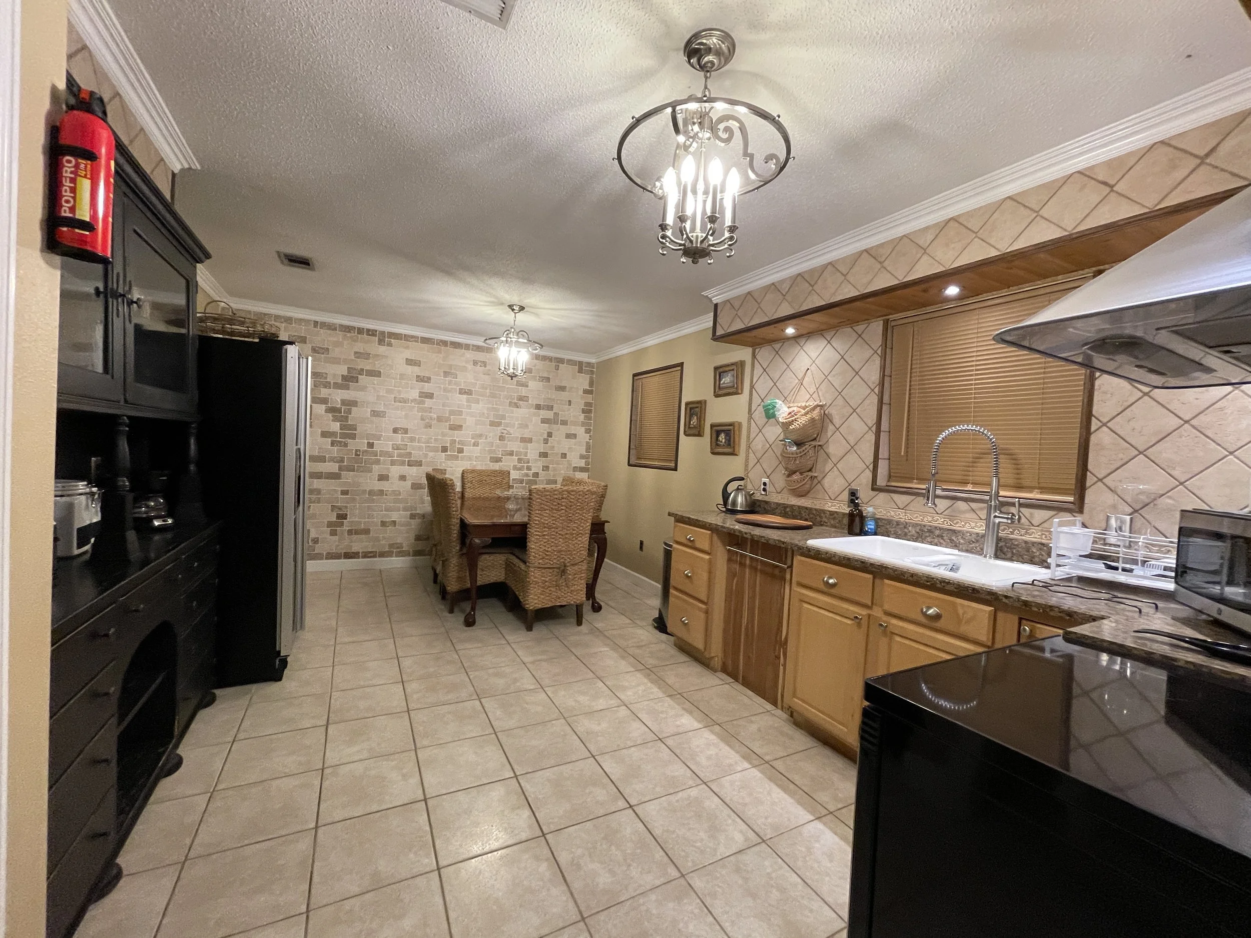 Fully stocked Kitchen with dining area for airbnb guests.