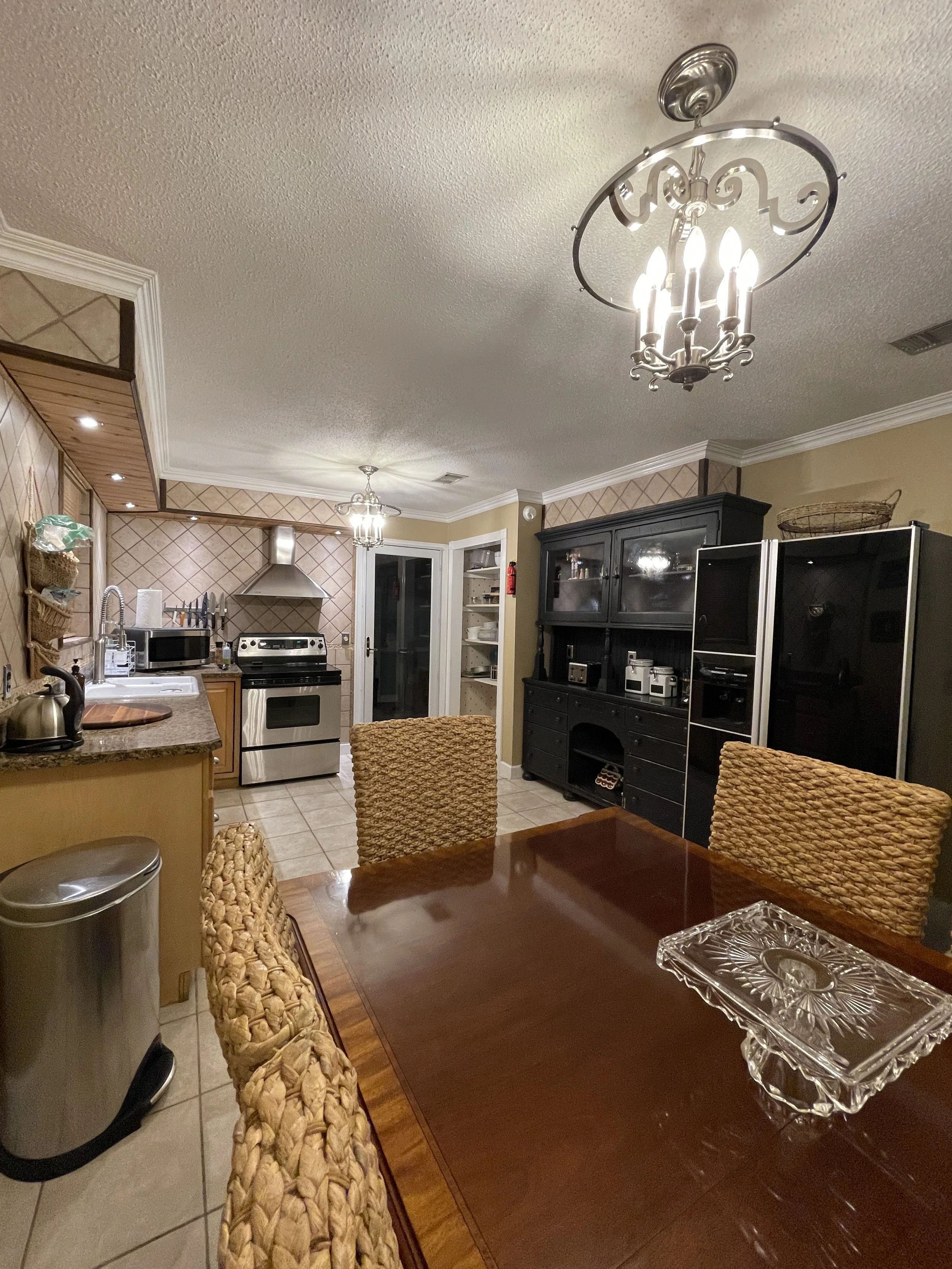 Fully stocked kitchen with table that seats up to 8 people.
