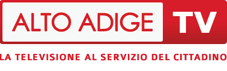 Logo di Alto Adige TV con sfondo rosso, testo bianco e rosso