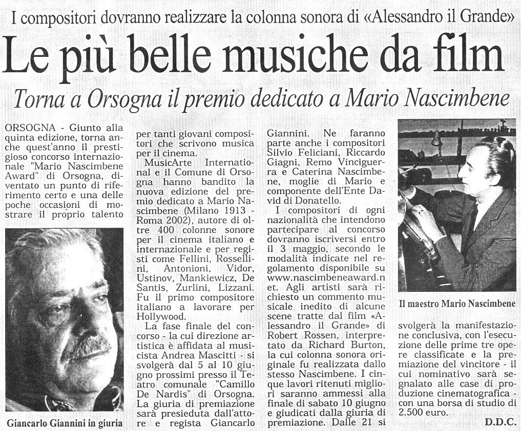 Fotografia di Giancarlo Giannini in giudizio, vestito con un completo scuro, che indossa un paio di occhiali e ha i capelli e la barba grigi.