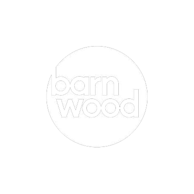 Logo with the words 'barn wood' inside a white circle.
