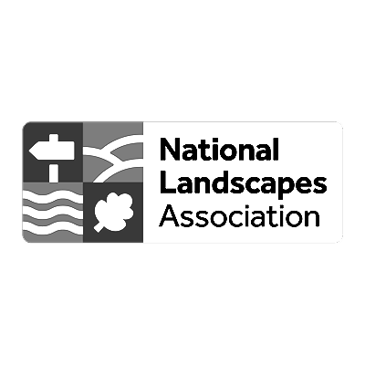 Logo of the National Landscapes Association featuring symbols of nature, water, and healthcare.