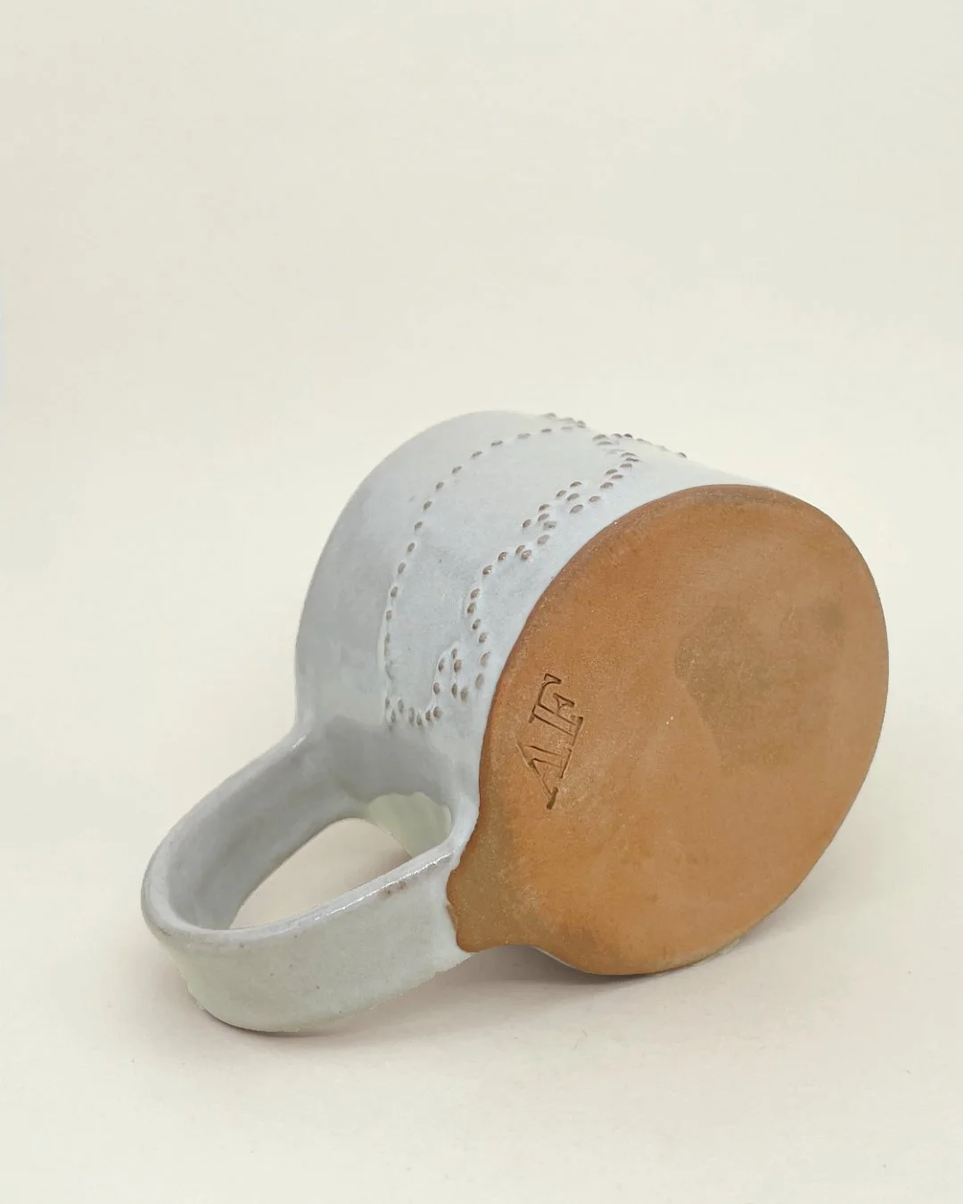 Fallen, Ceramic Mug, Zebidee #2, white gloss glaze, embossed dot detail, Decoration saves.jpg
