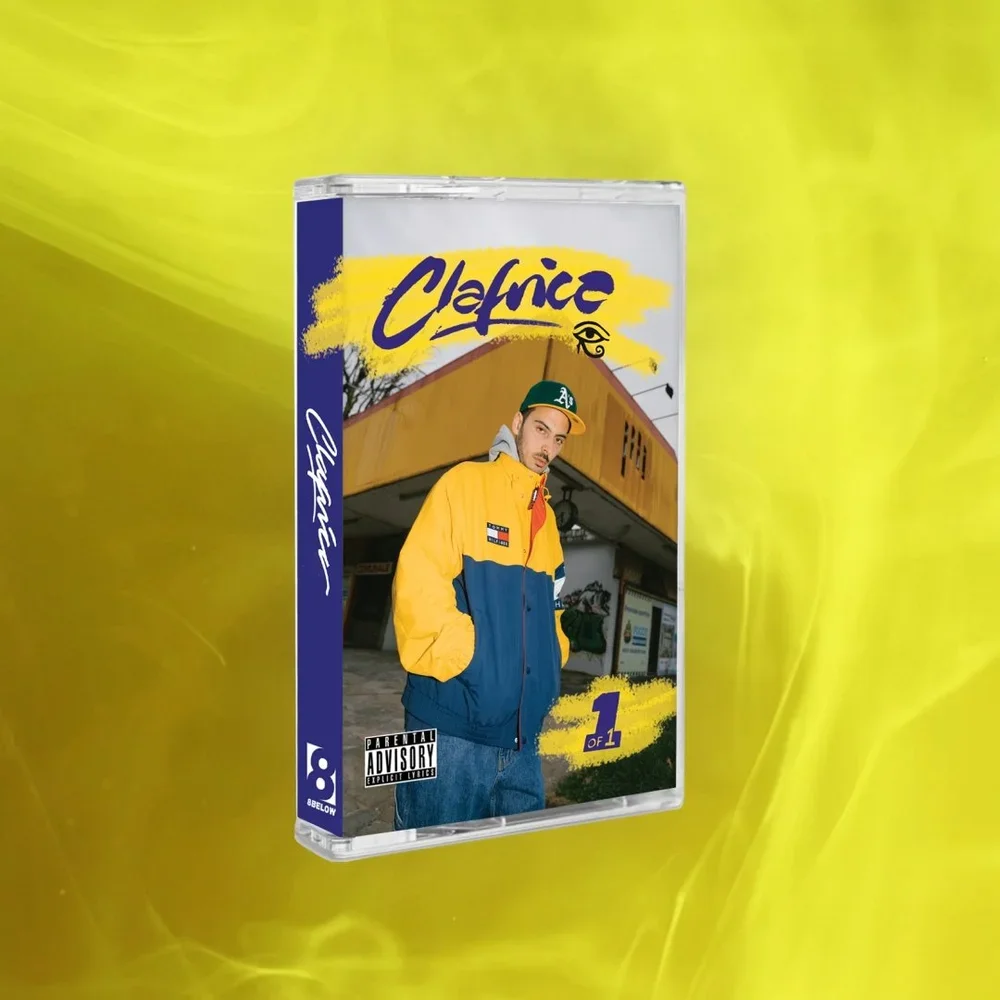 A cassette tape case with a cover featuring a man in a yellow and blue jacket, standing outdoors in front of a building. The cover has the text 'Clafice', '1 of 1', and includes a parental advisory label at the bottom.
