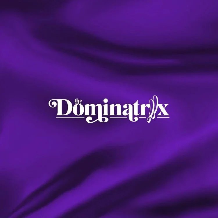 Purple silky fabric background with the white logo and text 'the Dominatext!'