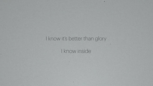 A quote on a light gray background that reads, 'I know it's better than glory I know inside'