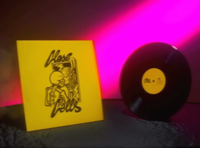 A yellow record sleeve with black illustrations and text, featuring a stylized drawing of a person and the words 'Chase Dole,' next to a black vinyl record with a yellow label, set against a pink and black background.