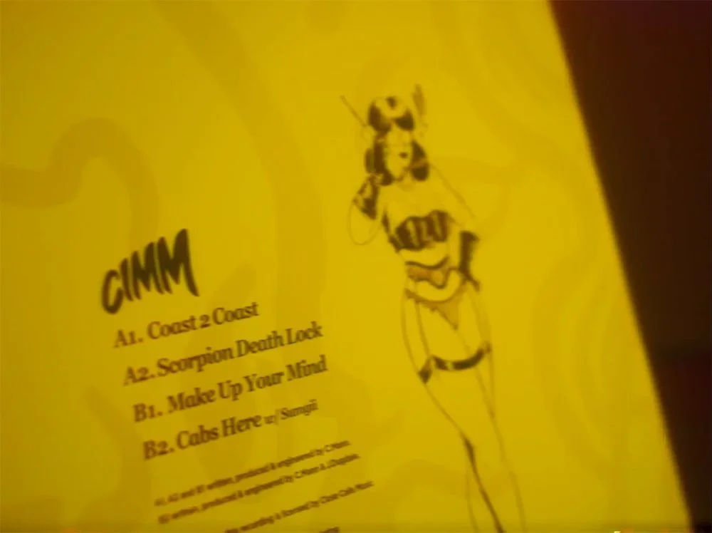 Yellow paper with a cartoon illustration of a woman in a swimsuit holding a rifle and list of cat-inspired phrases.